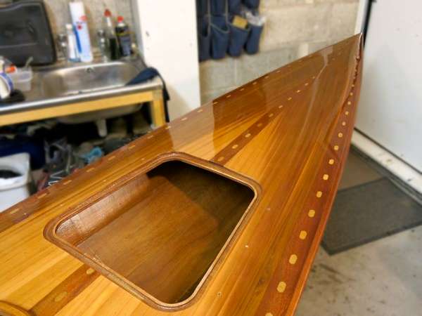 Watertight forward deck hatch for storage