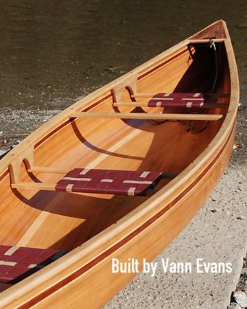 The Freedom 15 is a modern, efficient wood-strip canoe for one or two paddlers