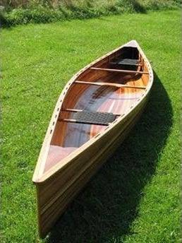 The Freedom 17-9 is a high-volume modern tripping canoe built from wood strips