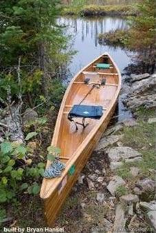 The Freedom 17 is a modern, efficient wood-strip canoe for extended trips