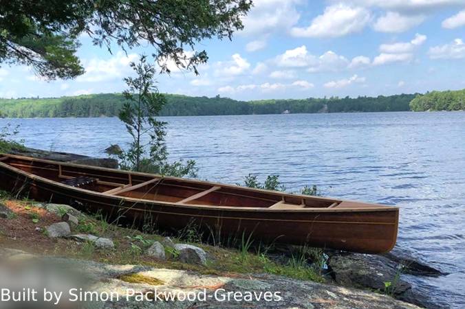 The Freedom 17 is a modern, efficient wood-strip canoe for extended trips