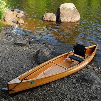 The Freedom Solo is an efficient solo canoe for experienced paddlers, built using wooden strips