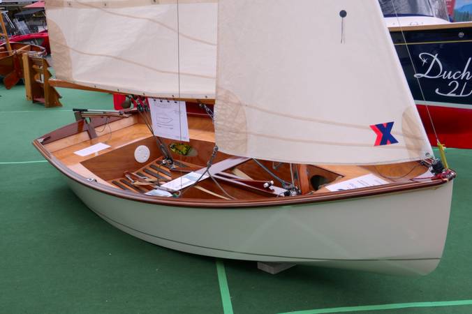 Gaffling classic wooden sailing dinghy with a traditional gaff rig