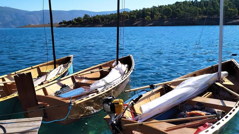 Three Goat Island Skiffs at a regatta