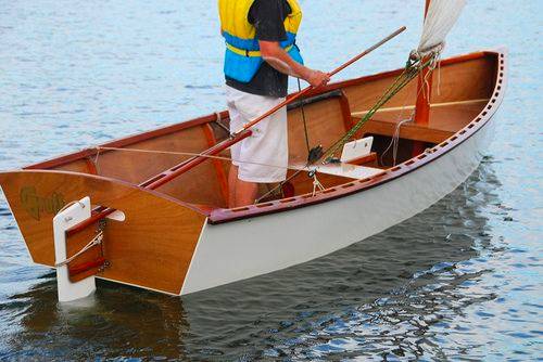 The Goat Island Skiff is a simple lightweight wooden sailing dinghy