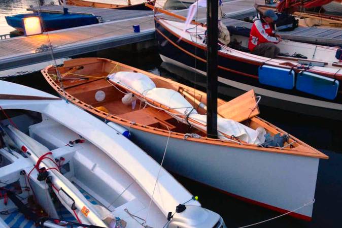 The Goat Island Skiff is a simple lightweight wooden sailing dinghy