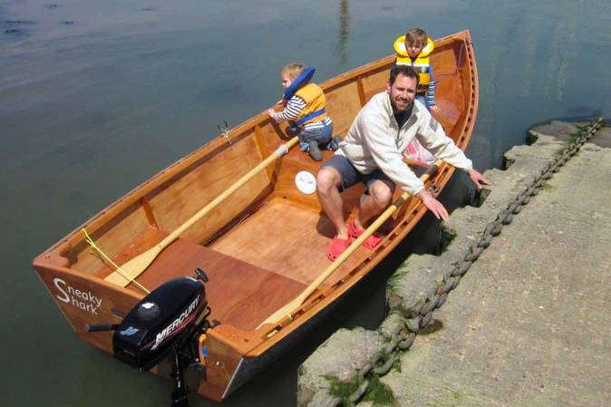 The Goat Island Skiff is a simple lightweight wooden sailing dinghy