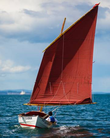 The Guider is a rugged, comfortable open boat for cruising under sail and oar