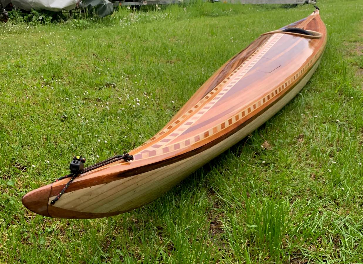 Guillemot strip planked wooden sea kayak built from a kit