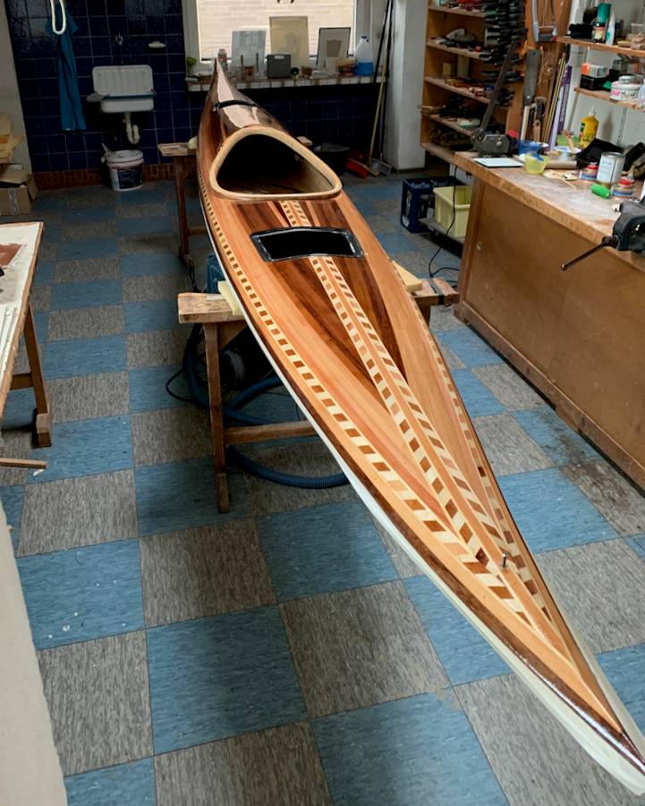 Guillemot strip planked wooden sea kayak built from a kit