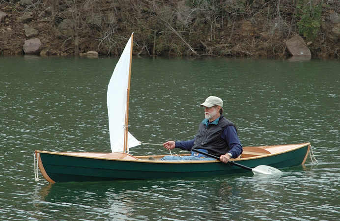 Paddling and sailng a home made Indian Girl canoe