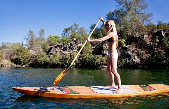 Canadian canoe - a lightweight wooden open boat that is easy to paddle