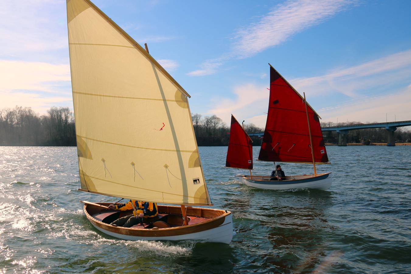 A stable but fast double-ended rowing or sailing boat based on a traditional Maine Peapod