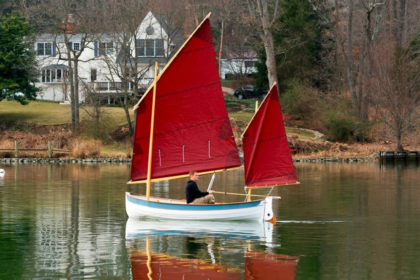 A stable but fast double-ended rowing or sailing boat based on a traditional Maine Peapod