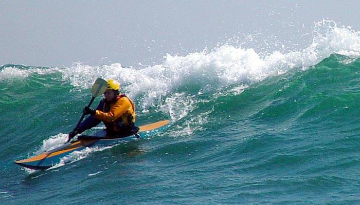 Surfing in a Matunuck kayak