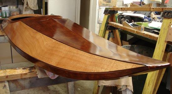 Highly polished surf kayak made at home