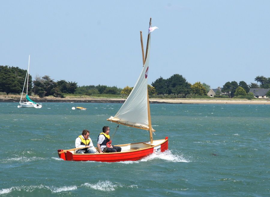 The Morbic 12 is a clinker plywood sailing dinghy with traditional appearance and versatile performance