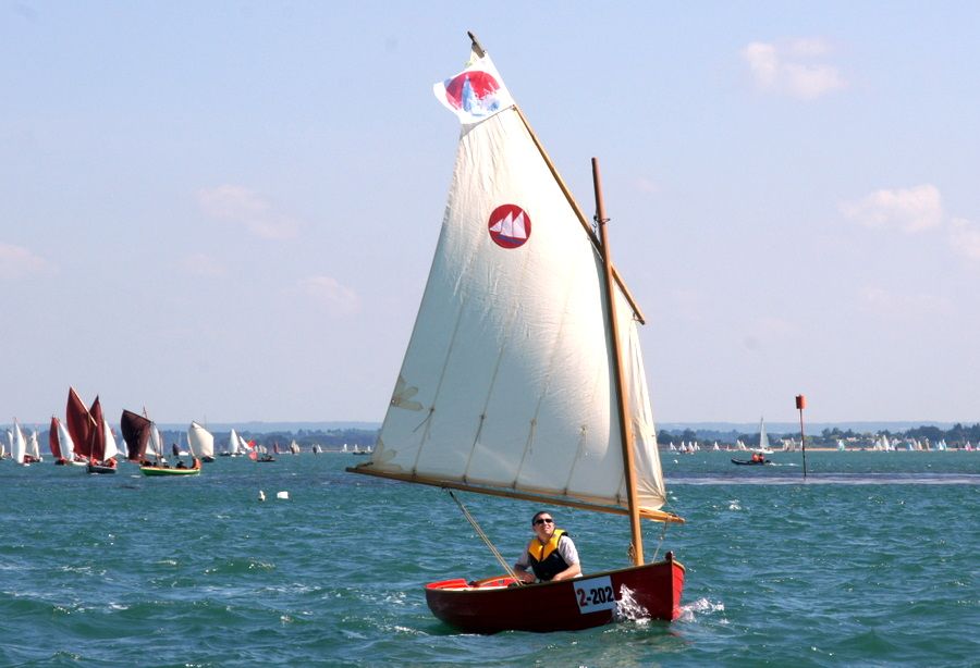 The Morbic 12 is a clinker plywood sailing dinghy with traditional appearance and versatile performance