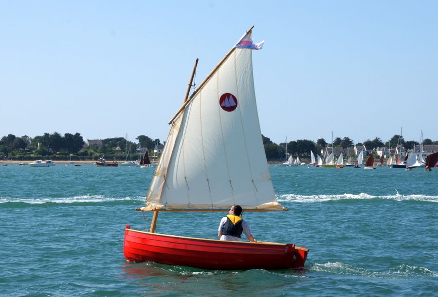 The Morbic 12 is a clinker plywood sailing dinghy with traditional appearance and versatile performance
