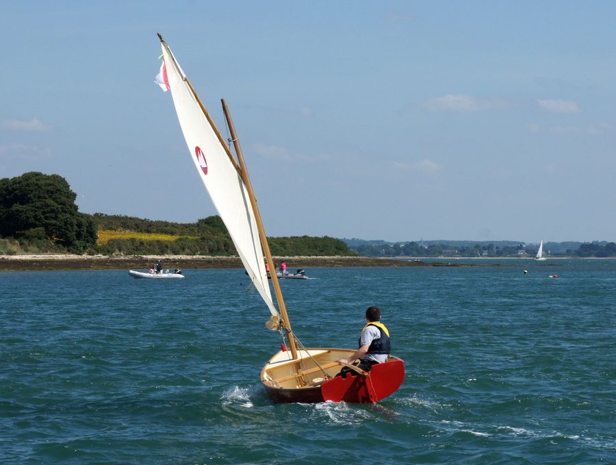 The Morbic 12 is a clinker plywood sailing dinghy with traditional appearance and versatile performance