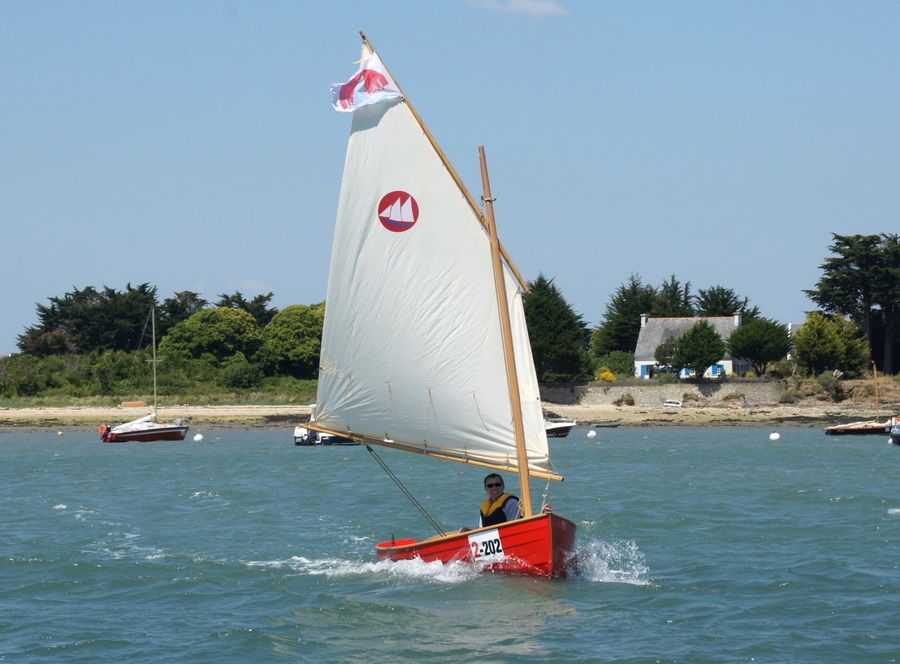 The Morbic 12 is a clinker plywood sailing dinghy with traditional appearance and versatile performance
