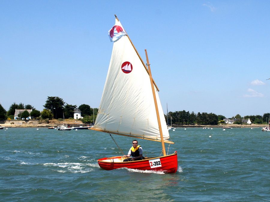 The Morbic 12 is a clinker plywood sailing dinghy with traditional appearance and versatile performance