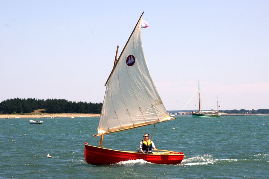 The Morbic 12 is a clinker plywood sailing dinghy with traditional appearance and versatile performance