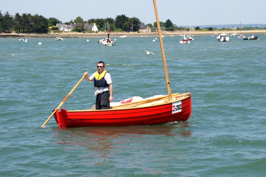 The Morbic 12 is a clinker plywood sailing dinghy with traditional appearance and versatile performance