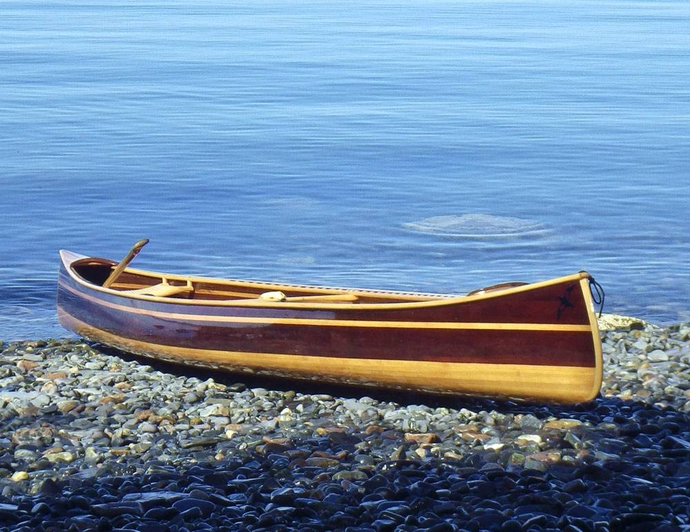 The Mystic River tandem canoe on a beach