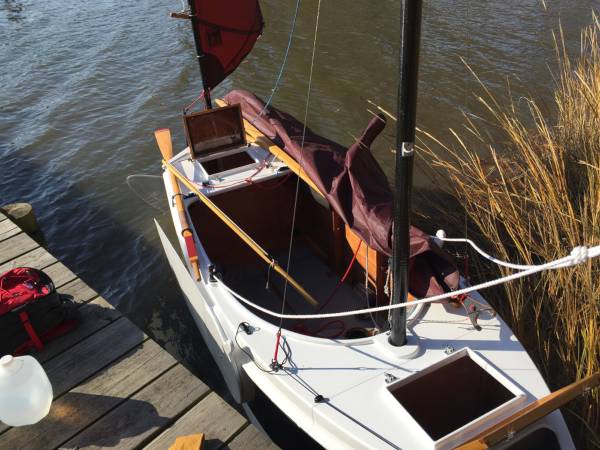 The Nesting Expedition Dinghy is a very compact wooden sailing boat for beach cruising