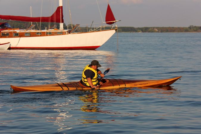 Hybrid Night Heron high-decked sea kayak with a cedar strip deck