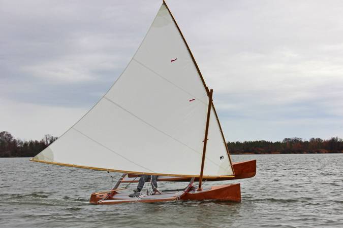 The Outrigger Junior is a fast sailing canoe with a huge lateen sail