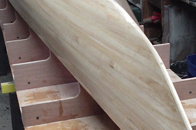 Paulownia strips milled with a bead and cove joint for strip-planked wooden boatbuilding