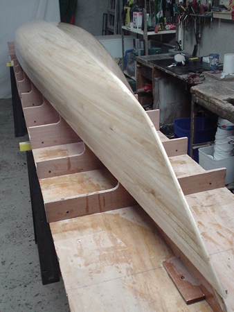 Strip-planking a wooden boat with Paulownia strips