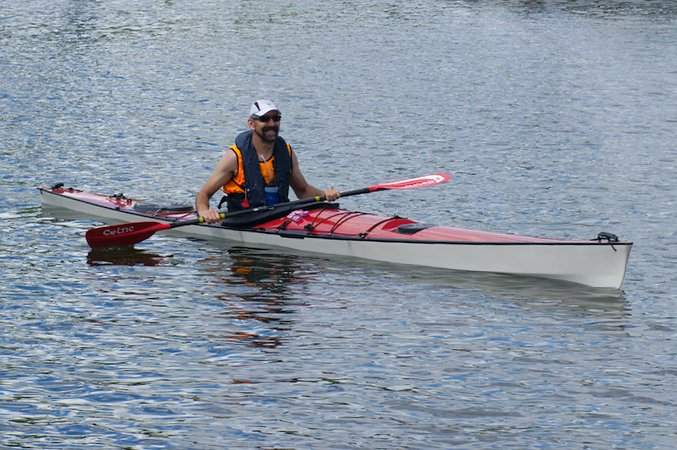 Pax 20 fast wooden racing kayak with a custom recessed deck hatch