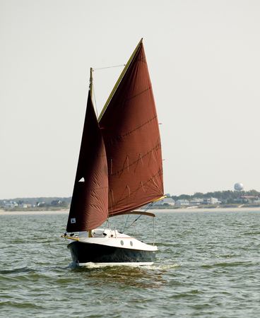 Pocketship sailing cruiser under way