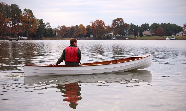 Sassafras 16 mkII modern lightweight clinker-style tandem canoe, paddled solo