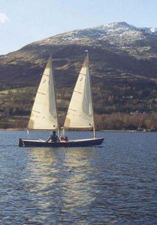 John's Sharpie is a spirited day sailer and an able camp cruiser