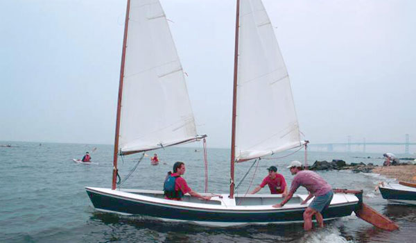 A two cockpit design provides dry seating for up to four adults in the Sharpie