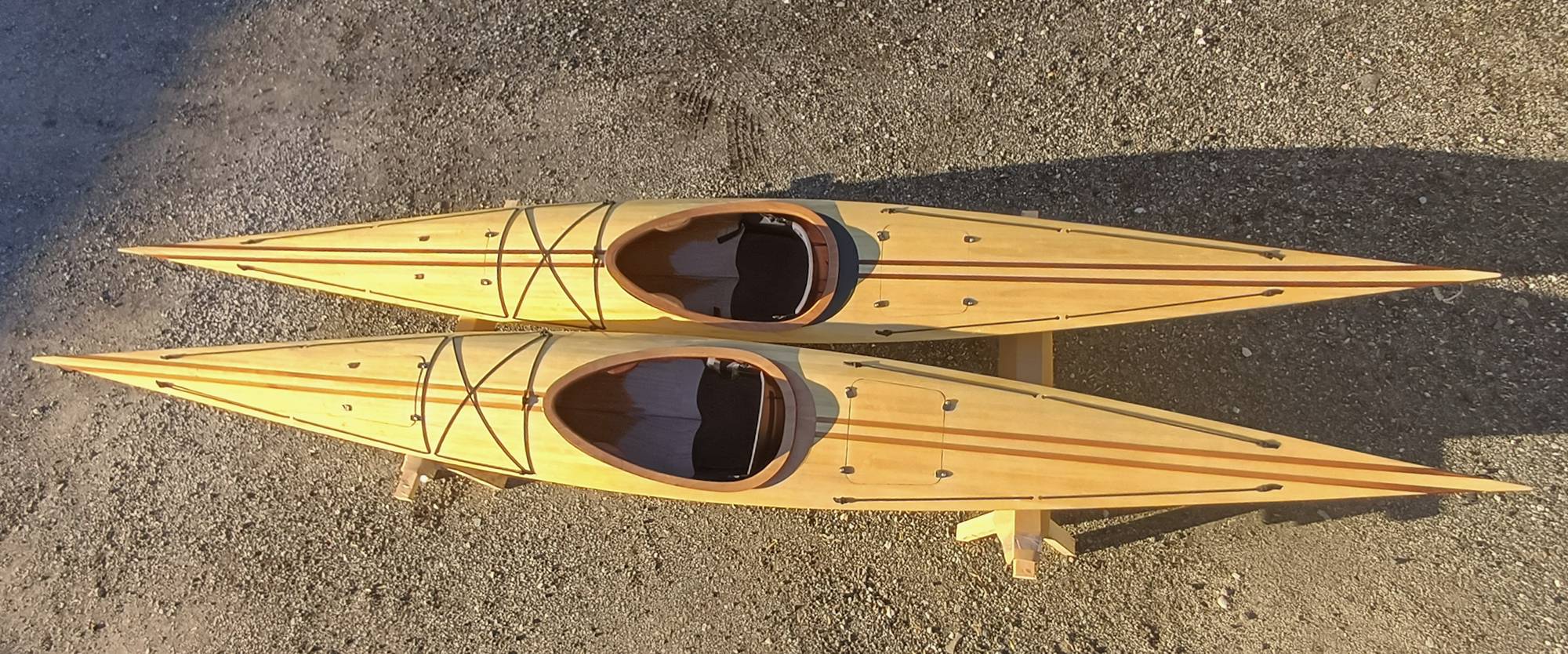 A pair of ready built Shearwater 17 Hybrid wooden kayaks