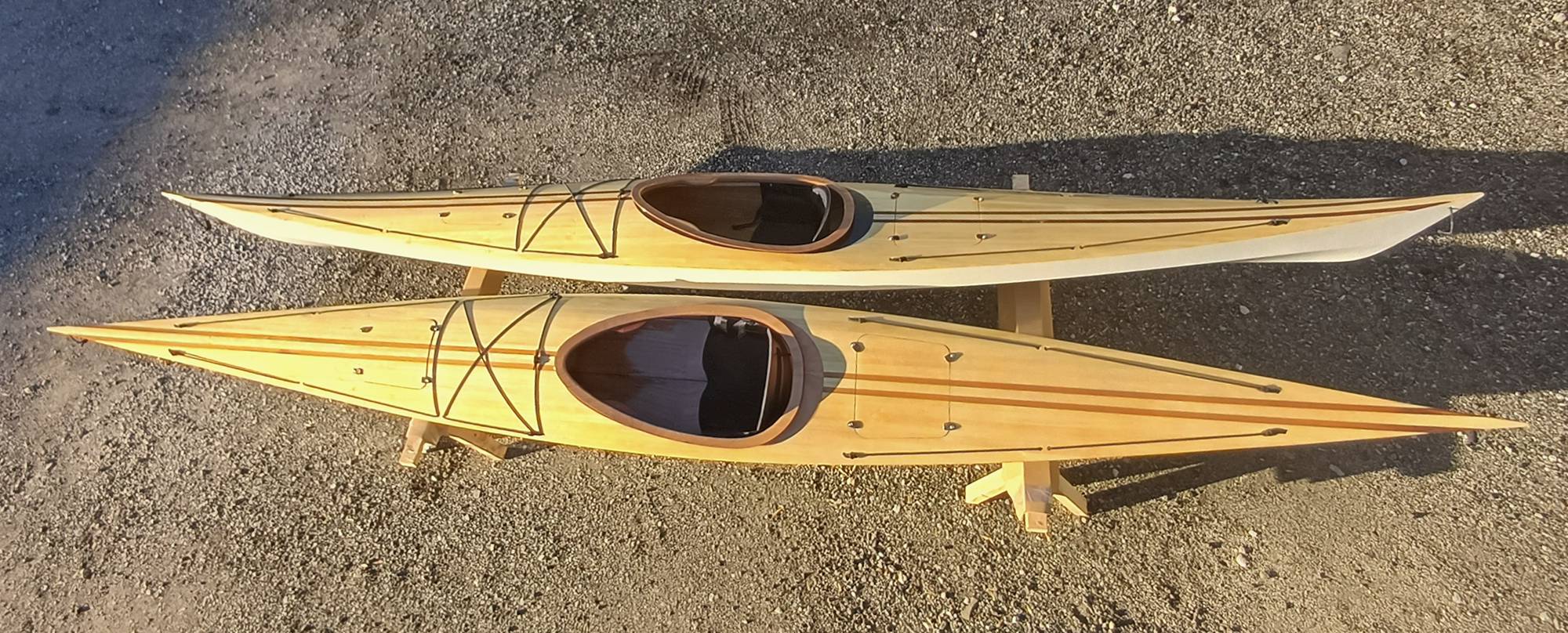 A pair of ready built Shearwater 17 Hybrid wooden kayaks