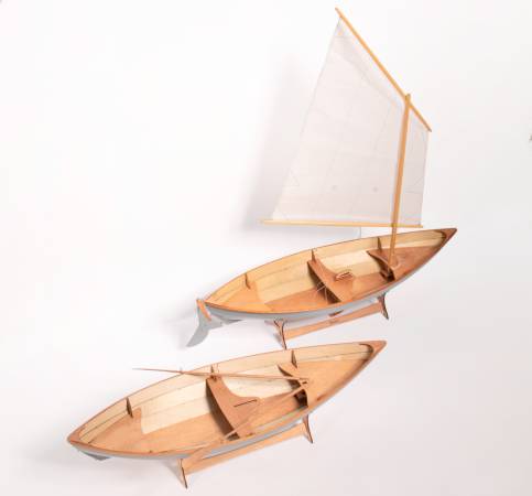 A scale model of the Skerry, rowing and sailing versions compared