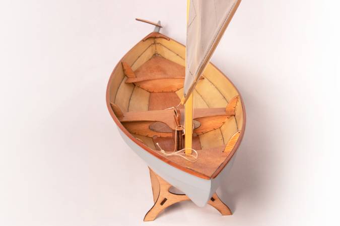 A scale model of the Skerry, set up as a sailing boat with the lug rig