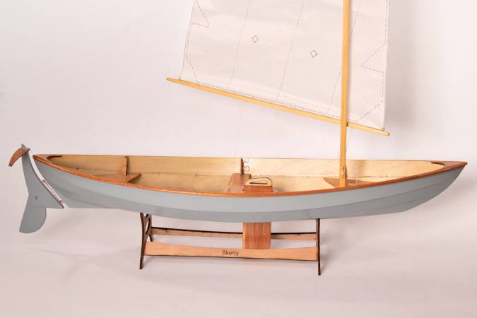 A scale model of the Skerry, set up as a sailing boat with the lug rig