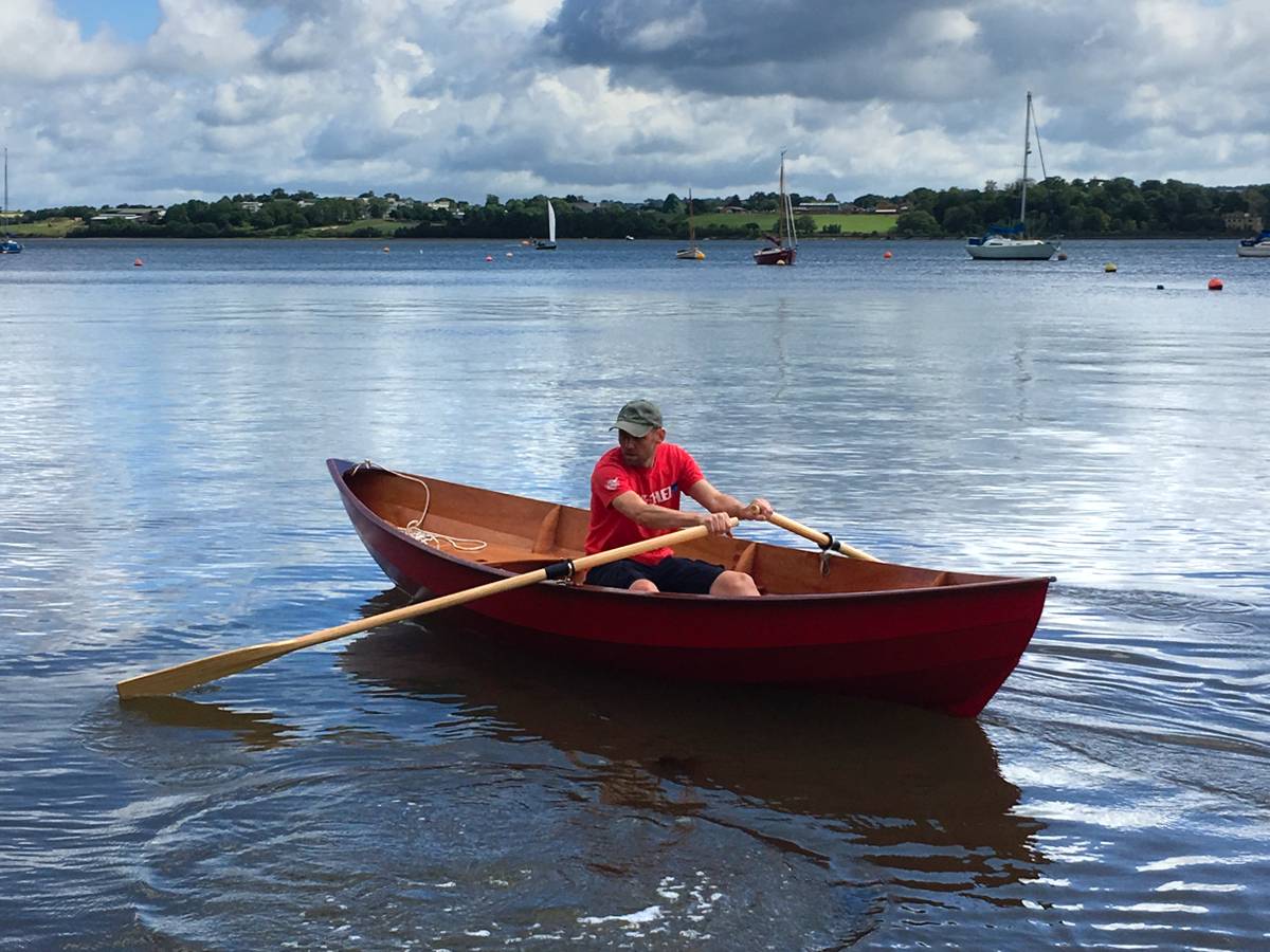 The Skerry is a 15ft wooden rowing and sailing boat, built from a kit