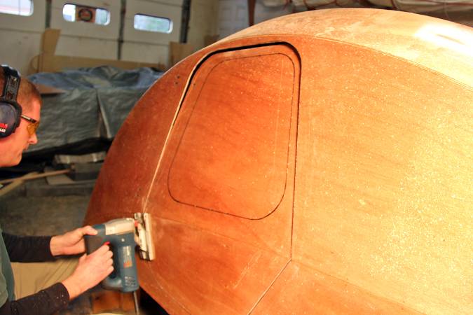 Cutting out the doors of the teardrop caravan