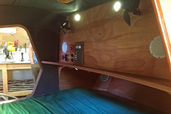 The spacious interior of the stitch-and-glue teardrop camper comfortably fits two adults