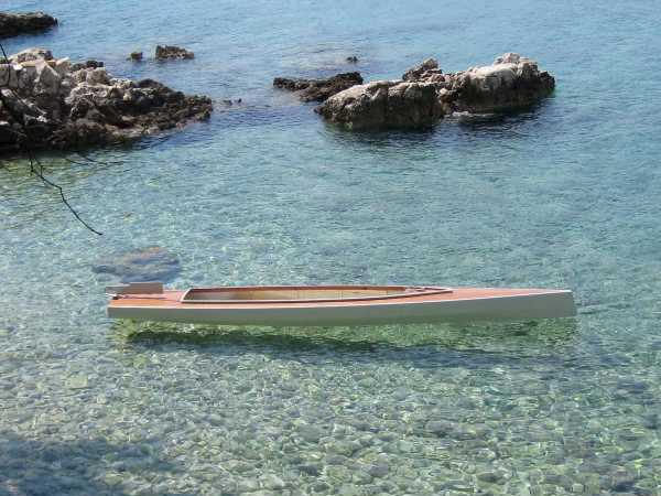 The main hull of the Trika 540 trimaran can be paddled as a large two-person kayak