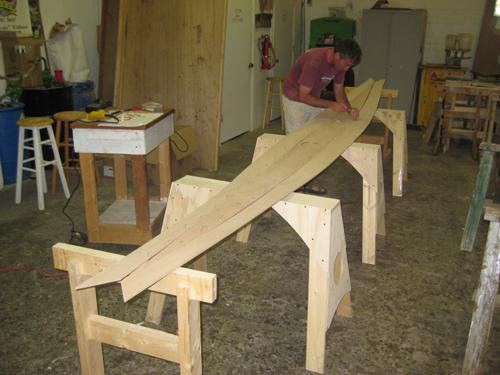 Stitching together the panels when building a tandem wherry rowing boat