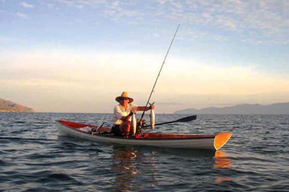 Fishing from a home made Fyne Boat Kits Wherry